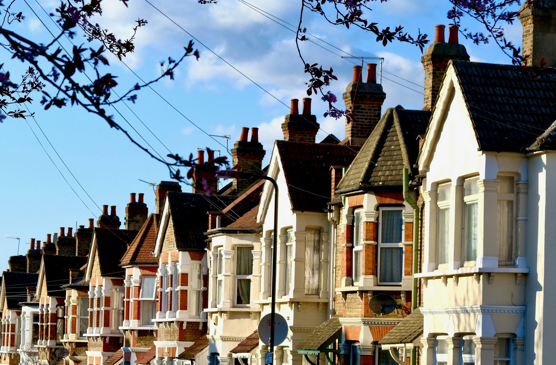 white and brown concrete houses under blue sky during daytime